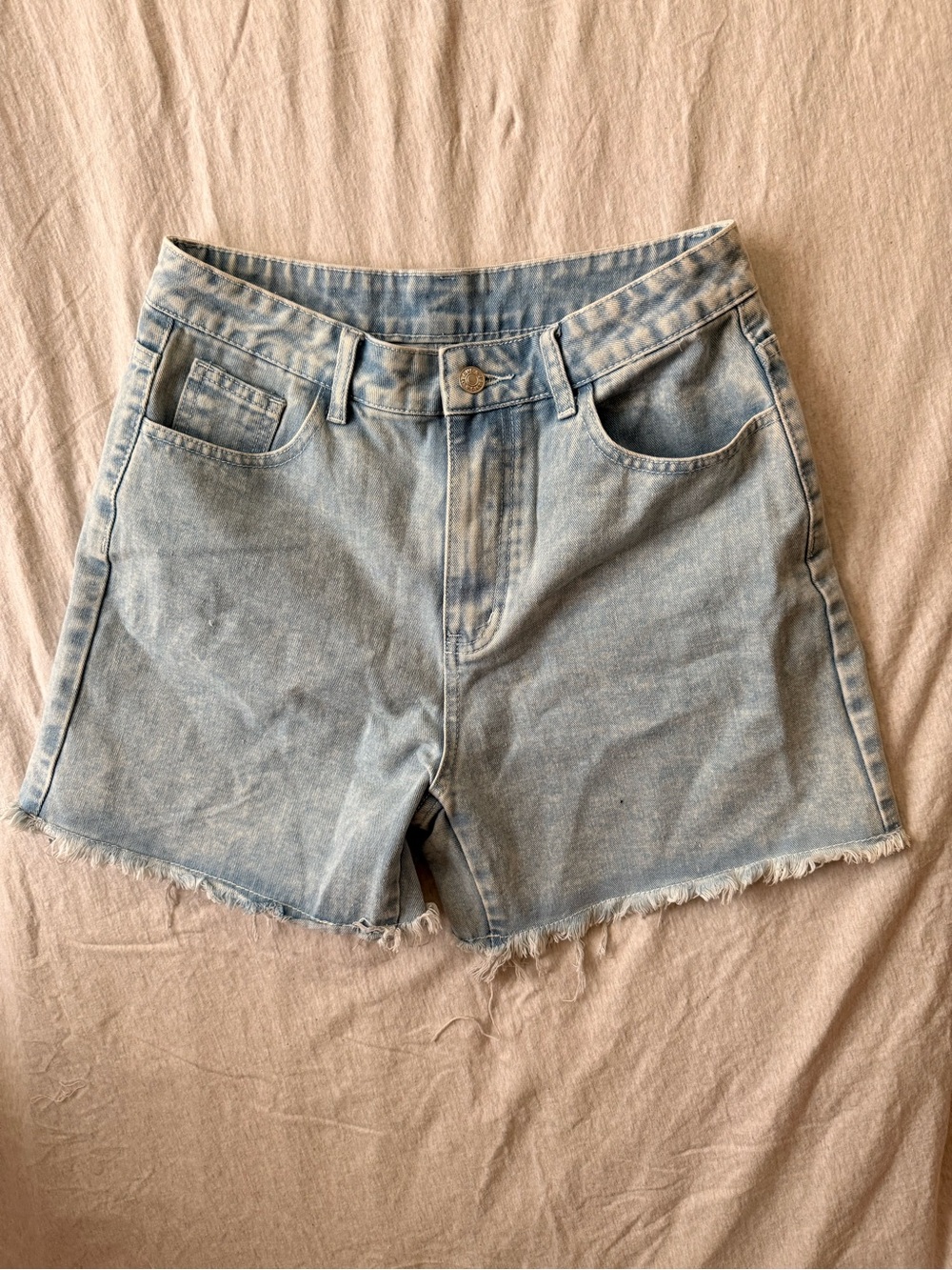 High-Rise Light Blue Denim Shorts with Frayed Hem